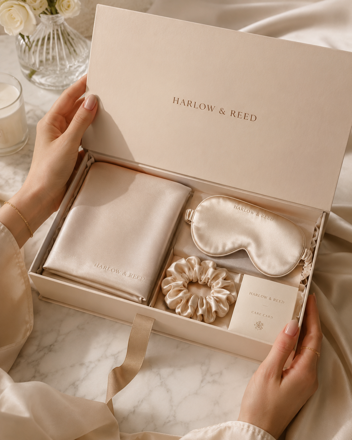 The Beauty Sleep Ritual Set — open keepsake box with silk pillowcase, sleep mask, scrunchie, and care card
